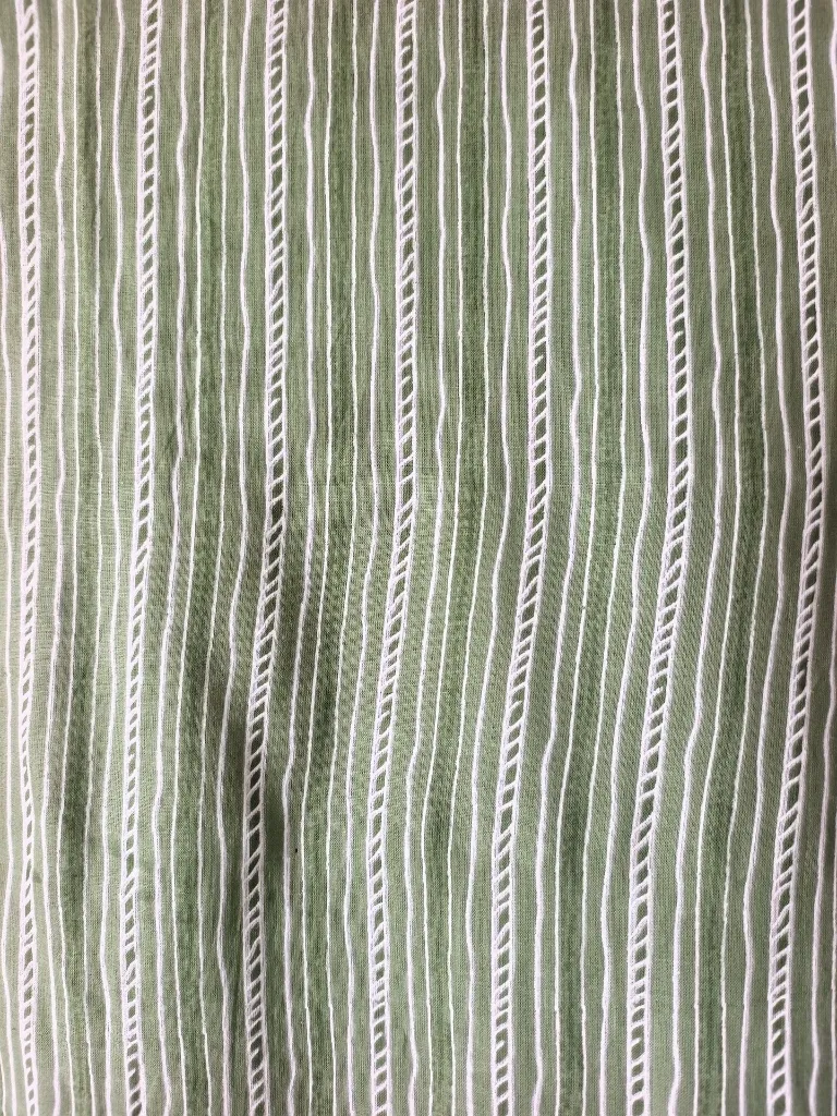 Green printed cotton fabric.webp